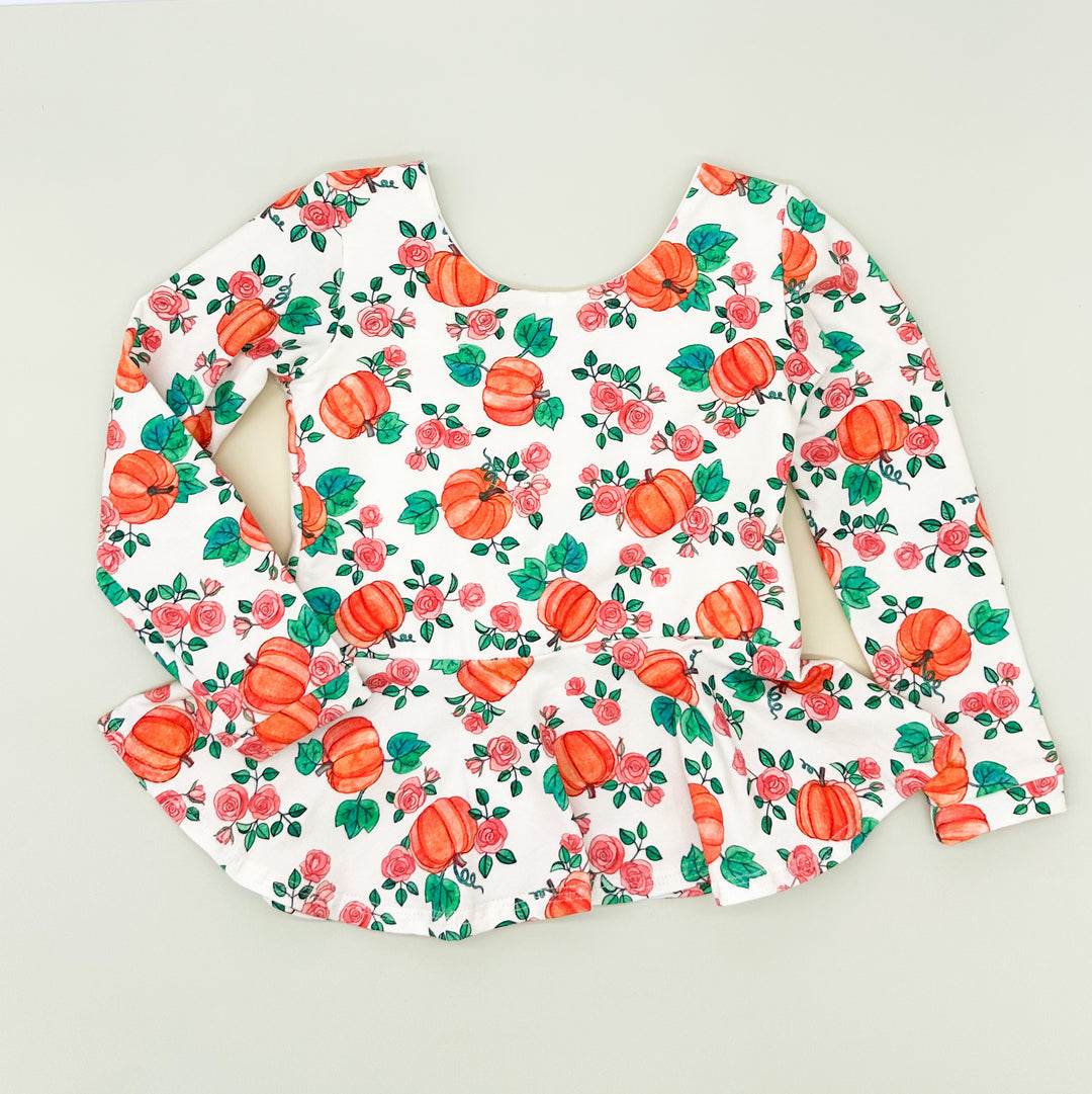 Rosey Pumpkin Peplum Top